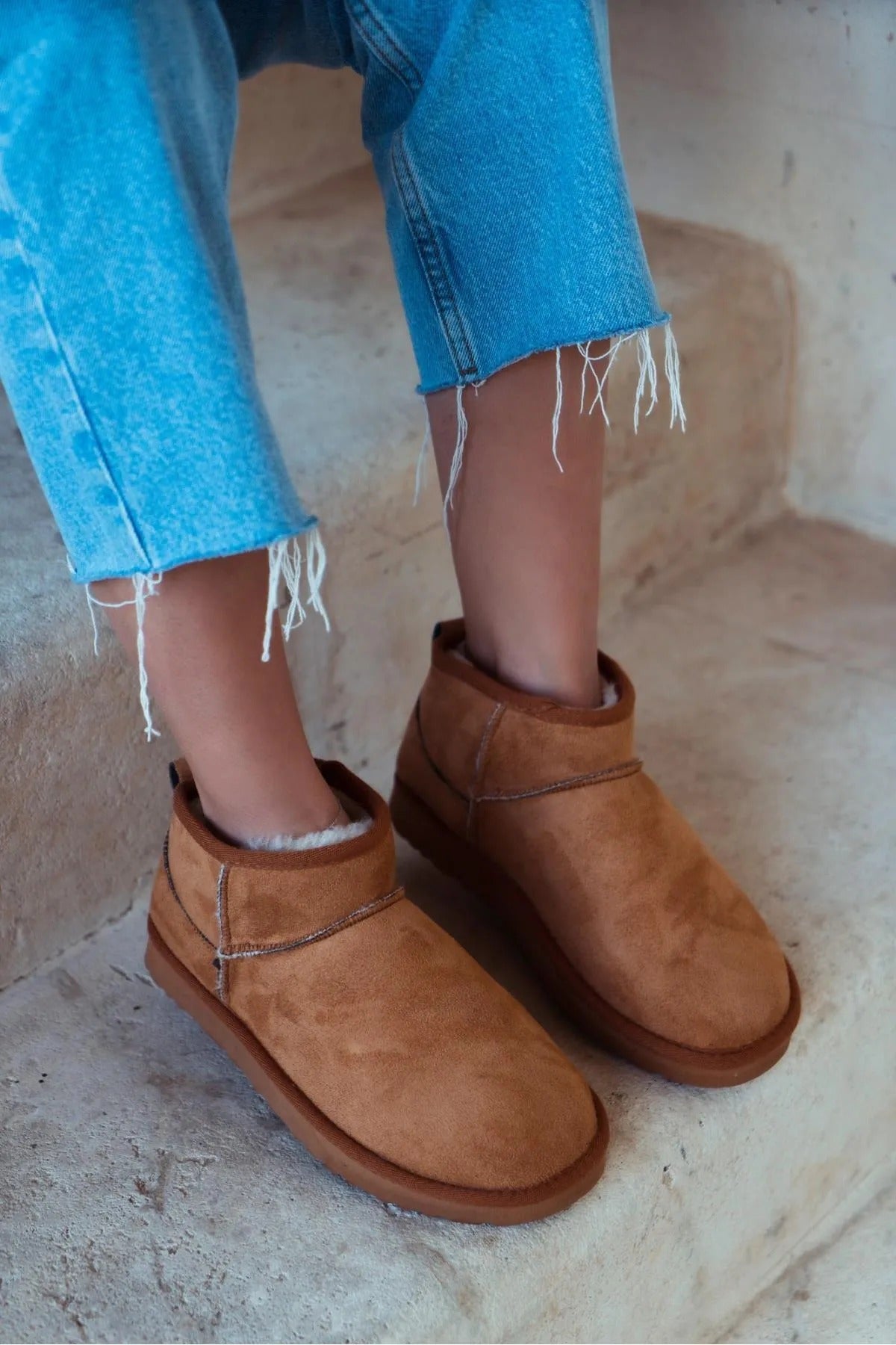 Rehaussez votre style avec des bottes doublées de fourrure