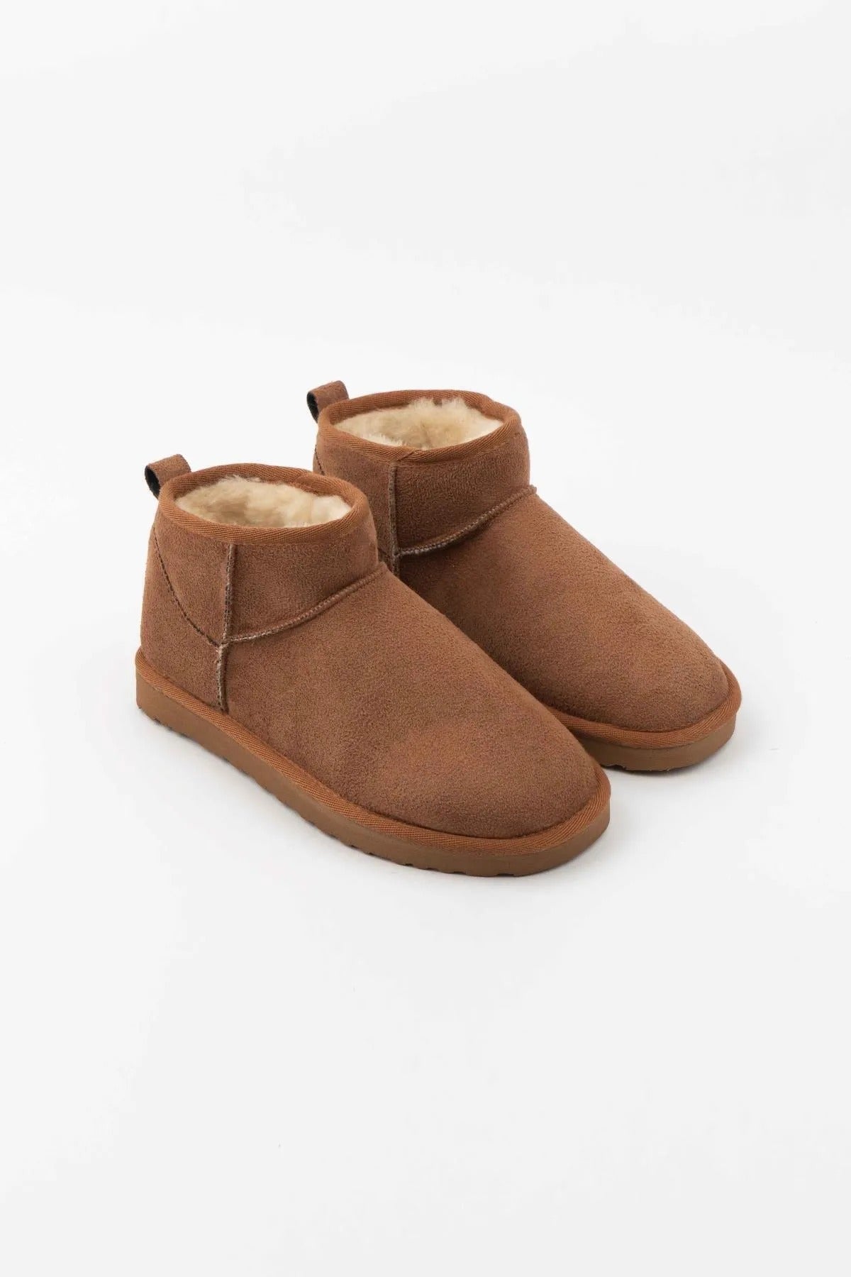 Rehaussez votre style avec des bottes doublées de fourrure