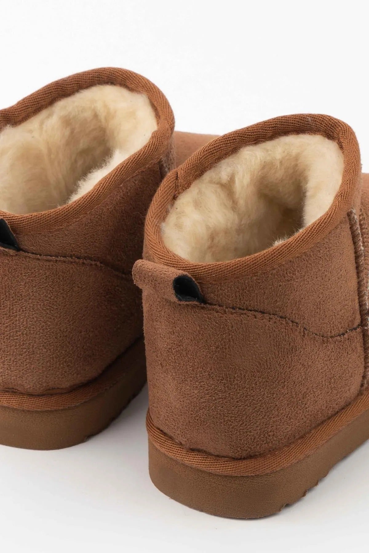 Rehaussez votre style avec des bottes doublées de fourrure