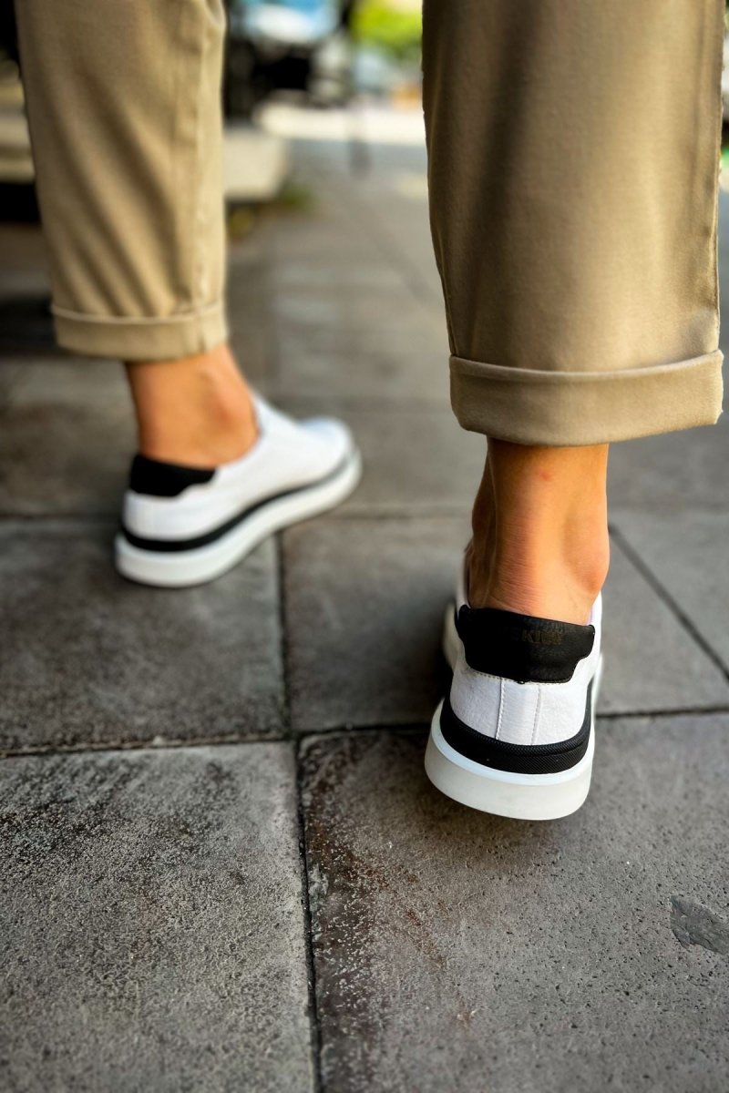 https://cdn.shopify.com/s/files/1/0721/4032/5144/files/ch979-santoni-gbt-spor-erkek-ayakkabi-beyazsiyah-chekichcom-1373247.jpg?v=1762499171