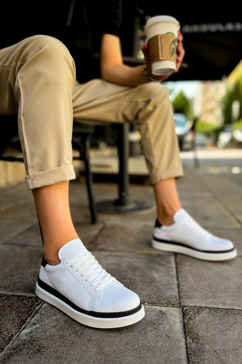 https://cdn.shopify.com/s/files/1/0721/4032/5144/files/ch979-santoni-gbt-spor-erkek-ayakkabi-beyazsiyah-chekichcom-9151874.jpg?v=1762499169