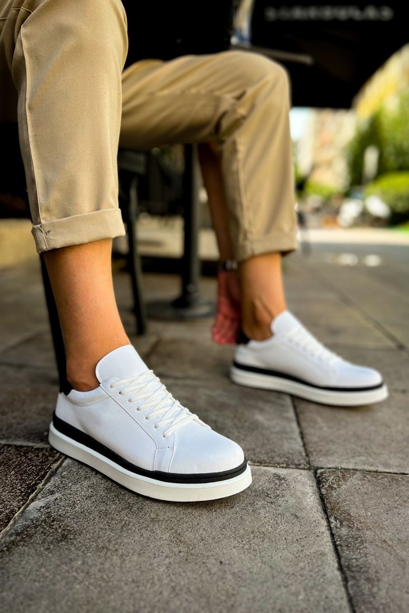 https://cdn.shopify.com/s/files/1/0721/4032/5144/files/ch979-santoni-gbt-spor-erkek-ayakkabi-beyazsiyah-chekichcom-9529434.jpg?v=1762499169